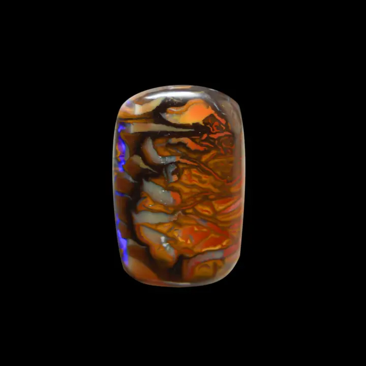 Natural Australian koroit opal with a rectangular shape and very colorful and decorative graphic motifs, one of its edges is highlighted with violet brilliance.