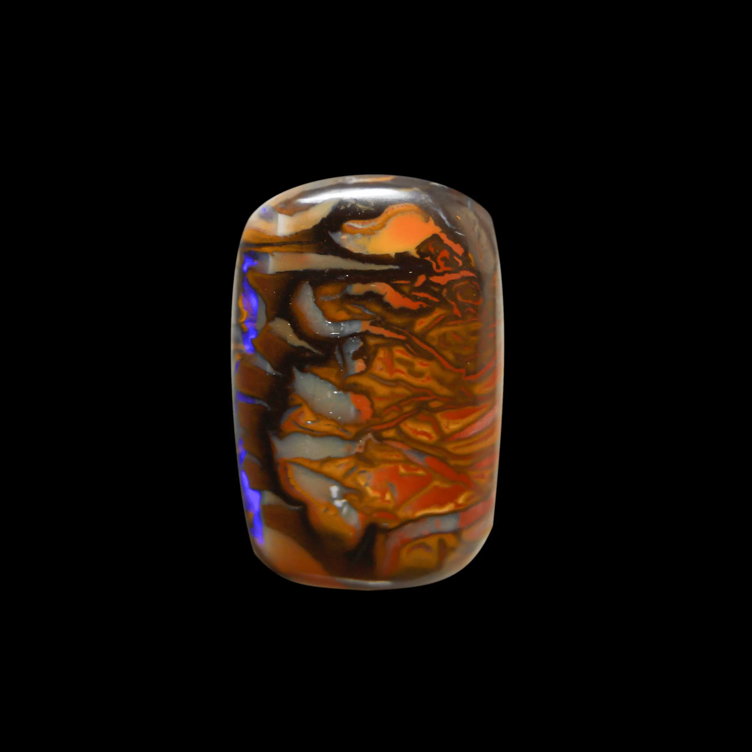 Natural Australian koroit opal with a rectangular shape and very colorful and decorative graphic motifs, one of its edges is highlighted with violet brilliance.
