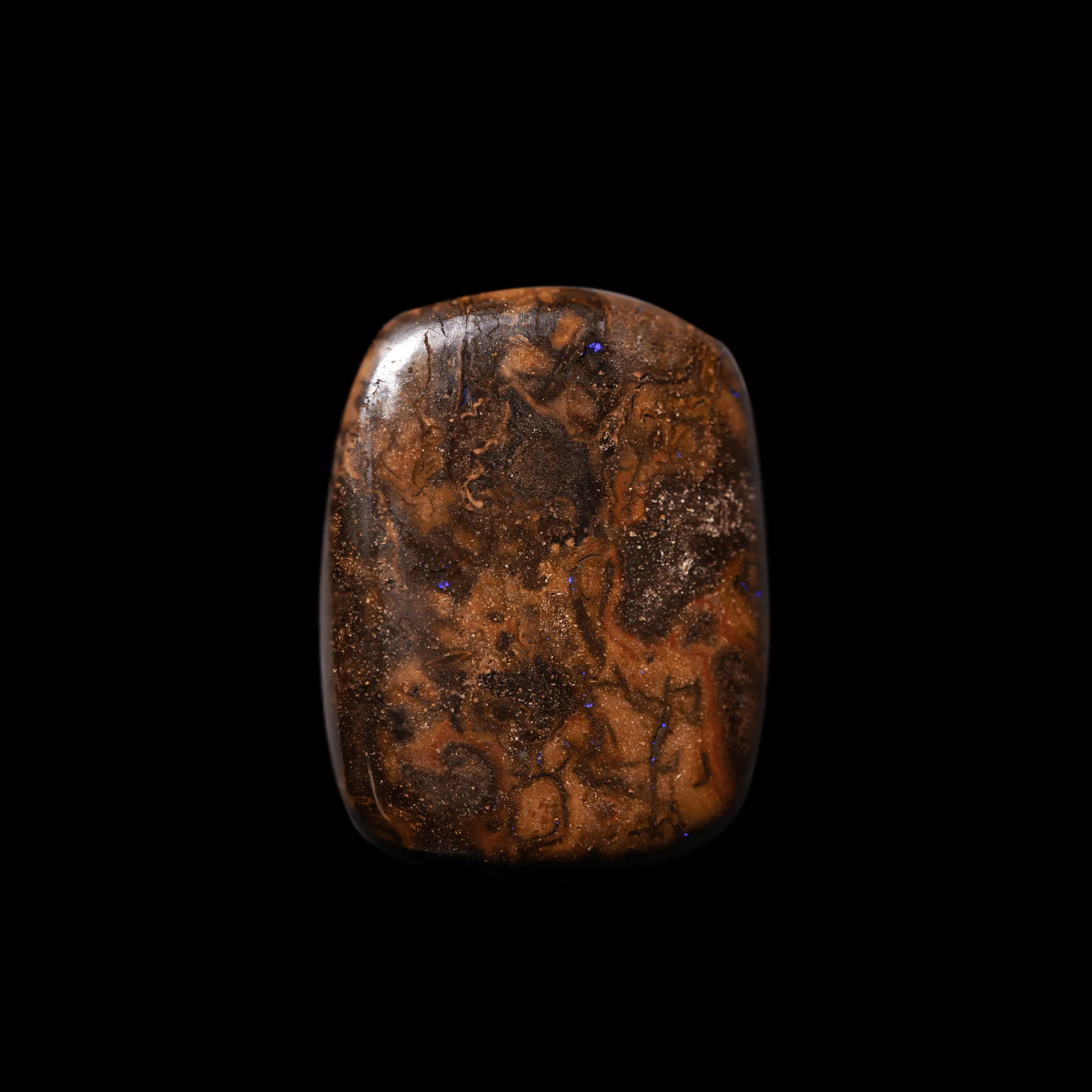 Natural Australian Koroit opal cut into a rectangle of pretty shades of brown and dotted with purple microglitter.