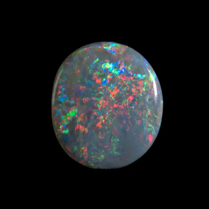 Dark multicolored opal with dominant red and blue diffraction