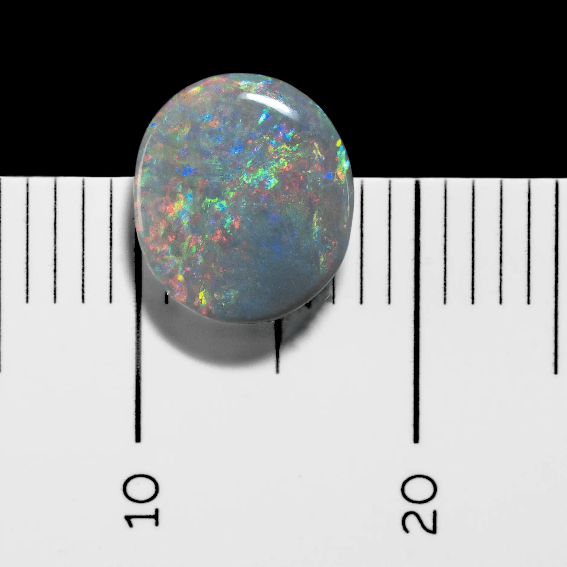 Opale sombre multicolore a diffraction dominante rouge et bleue (0,9 ct) – Image 6