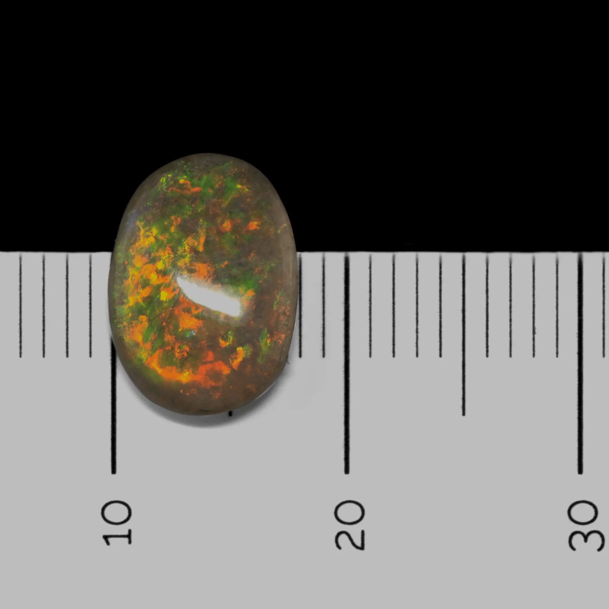 Lovely green, yellow and orange white opal cabochon (1.3 ct) - Image 6