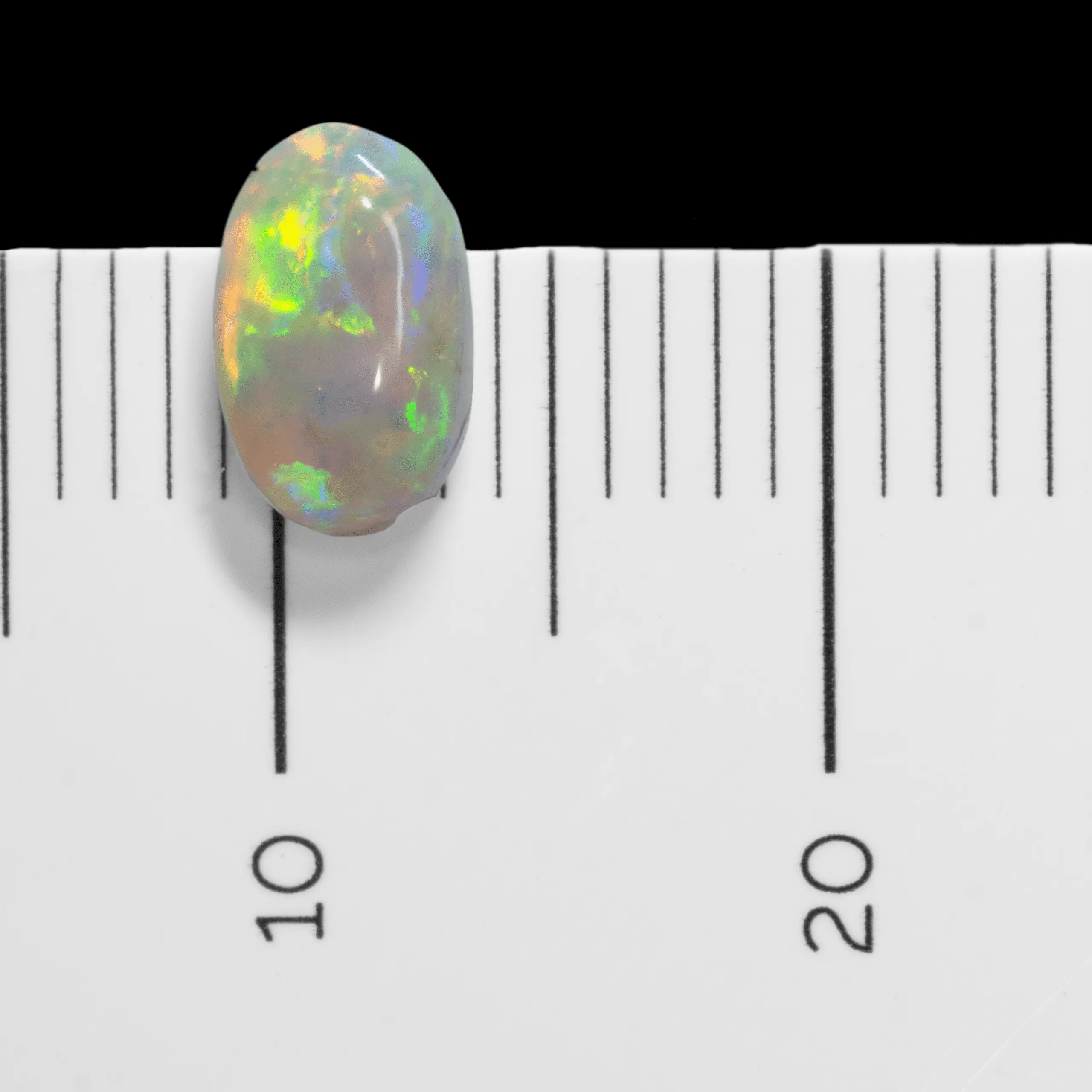 Ovale translucide et multicolore d'opale cristal claire (0,3 ct) – Image 6