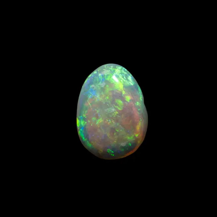 Natural Australian opal from the Lightning Ridge mines, 0.5 carat of dark opal with a clear, crystalline tone and a pretty green sheen.