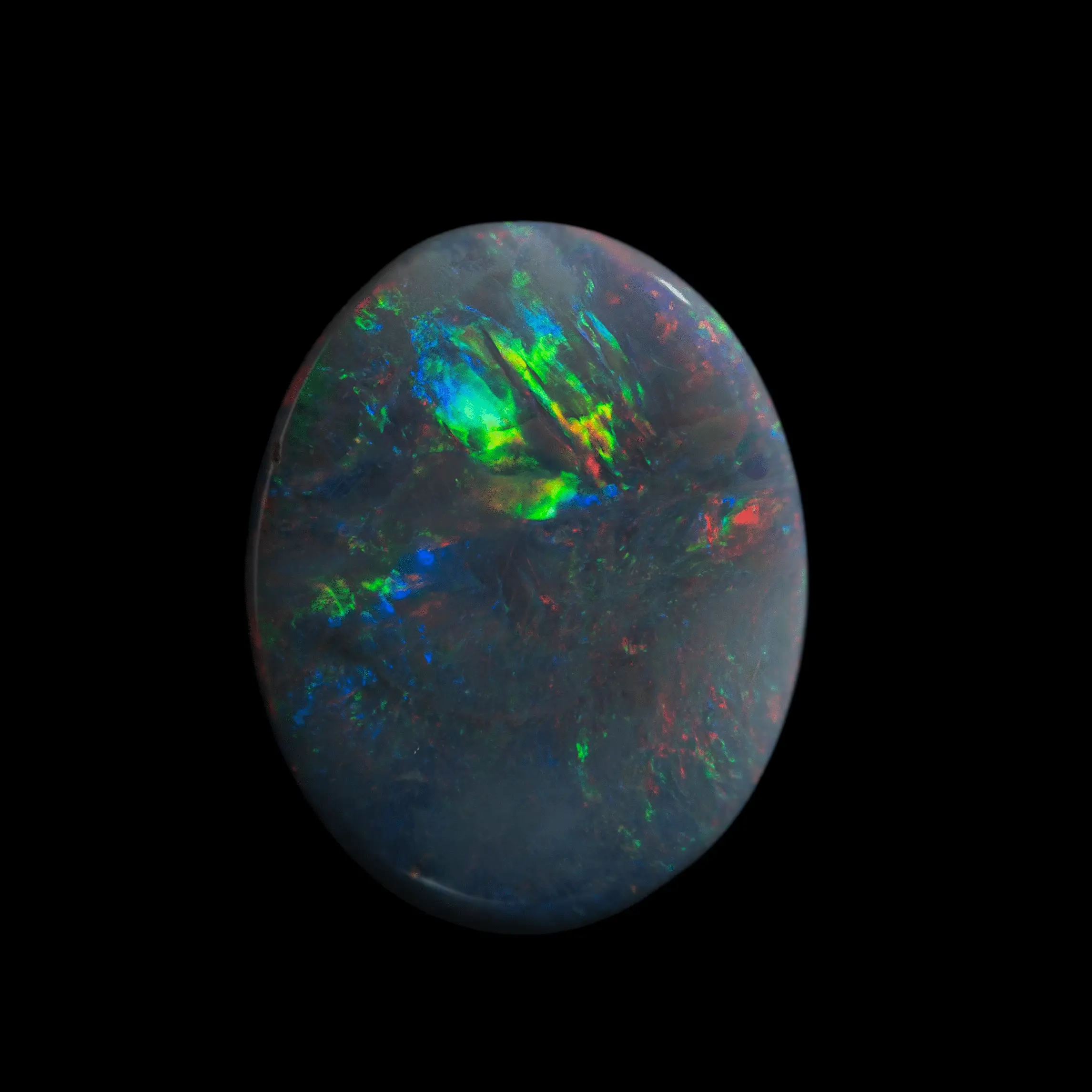 Opale naturelle australienne des mines de Lightning Ridge, grand et magnifique cabochon de 5,2 carats à brillances de couleurs multiples à dominance rouge, bleue et verte
