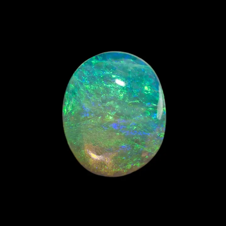 Opale naturelle australienne des mines de Lightning Ridge, joli cabochon de 0,9 carat d'opale cristal translucide principalement coloré de vert