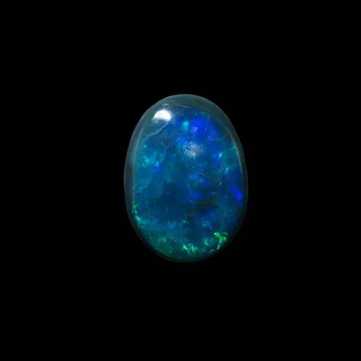 Natural Australian opal from the Lightning Ridge mines, lovely 1.6 carat cabochon with blue and green brilliance.