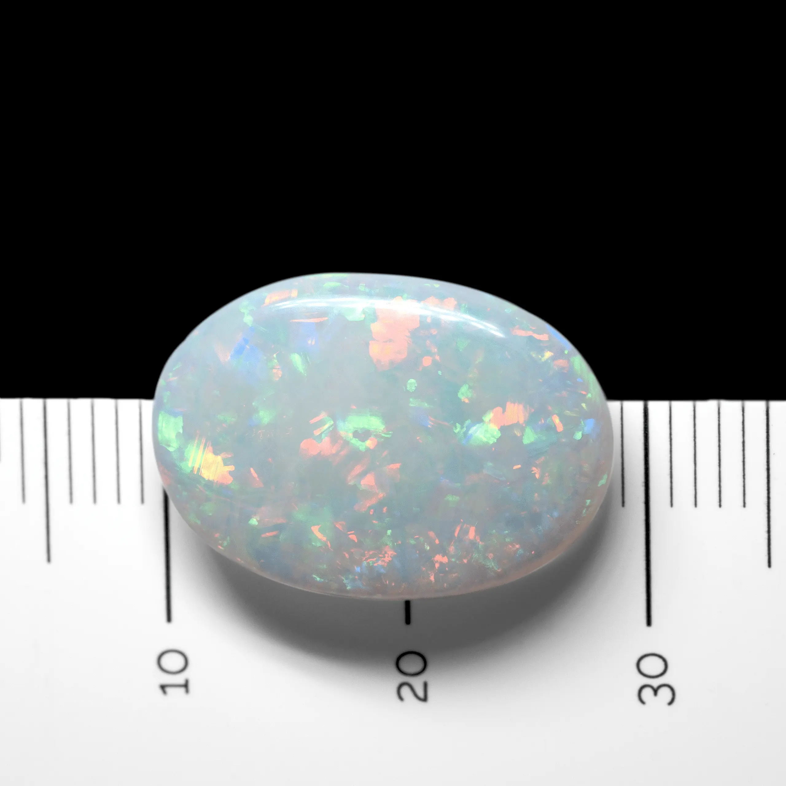 Brilliant green, red and blue Brazilian oval opal (6.6 cts) - Image 10