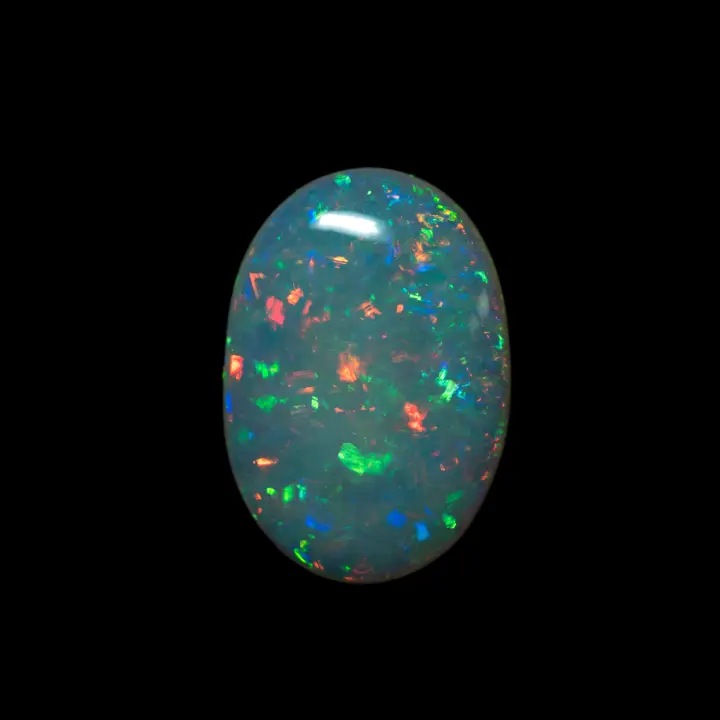 Natural Brazilian opal from the Horca mines, magnificent clear oval of 6.6 carats very brilliant harmoniously colored green, red and blue