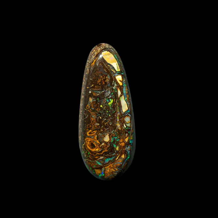 Natural Australian opal from the Koroit mines, free form of 9.4 carats with abstract coloured patterns, coloured in ochre, cream, brown, blue and with a green shine.