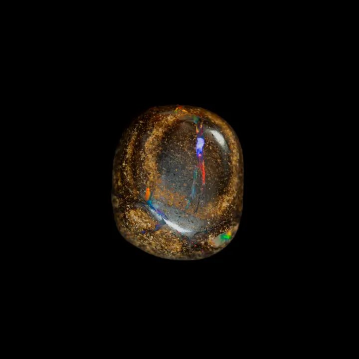 Natural Australian opal from the Koroit mines, diacrite cabochon with a brilliant multicolored barred O of 12.0 carats
