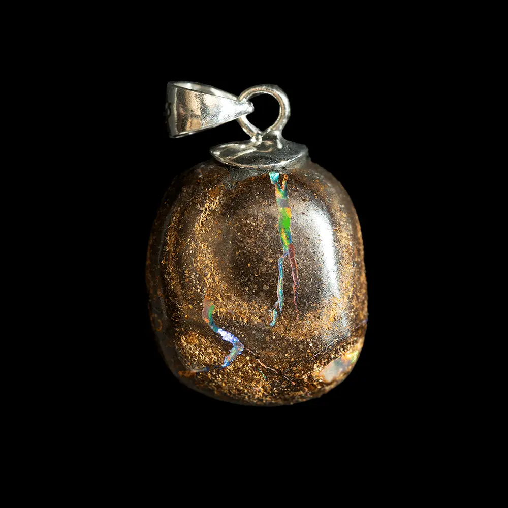 Natural Australian opal from the Koroit mines, diacrite cabochon with a brilliant multicolored barred O of 12.0 carats mounted on a 925 silver setting evoking an on-off button.