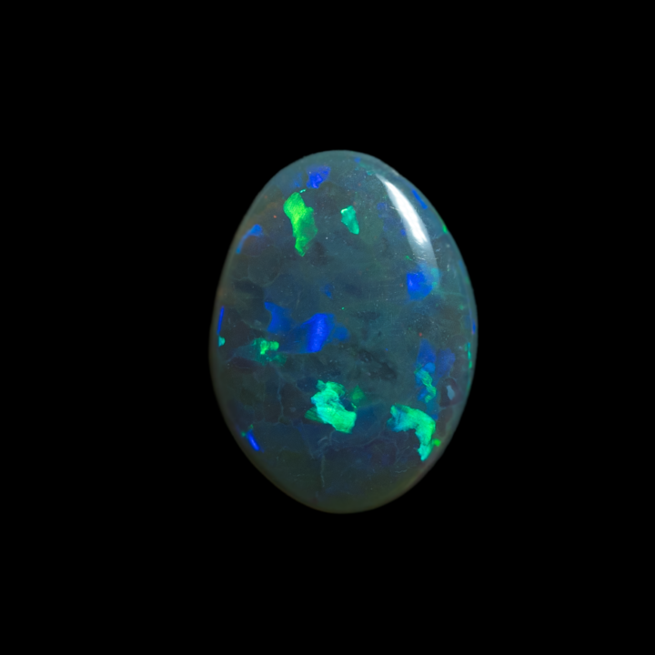 Opale naturelle australienne des mines de Lightning Ridge, cabochon ovalisé d'opale très sombre de 1,1 carat très brillant de larges éclats verts et bleus