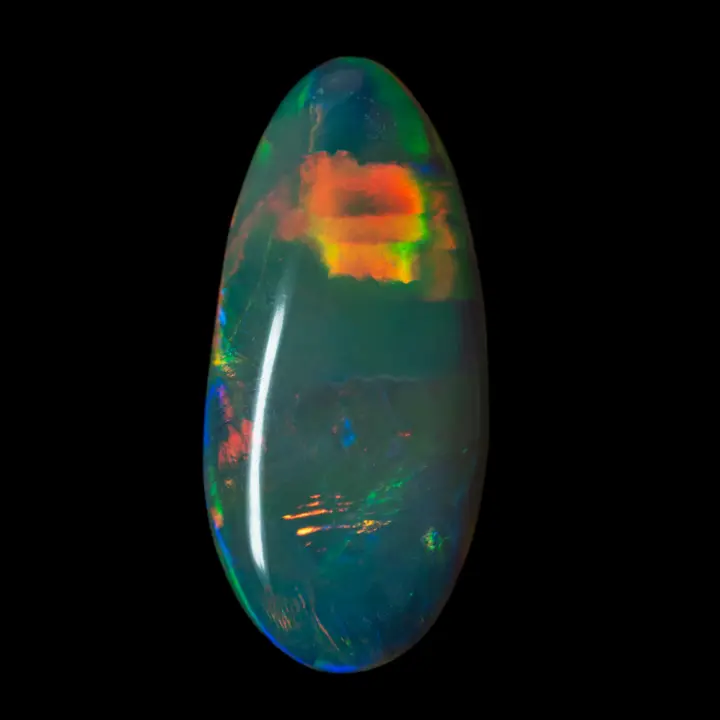 Opale naturelle australienne des mines de Lightning Ridge, magnifique ovale navette à colorations compartimentées et iridescentes, colorations majoritaires d'orange, vert et jaune