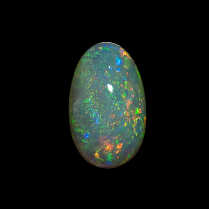 Natural Australian opal from the Lightning Ridge mines, 1.6-carat cabochon of crystal-clear opal with intensely brilliant green and orange highlights.