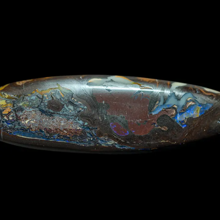 Natural Australian opal from the Koroit mines, large ellipse weighing 74 carats with colourful, varied and brilliant patterns on both sides.