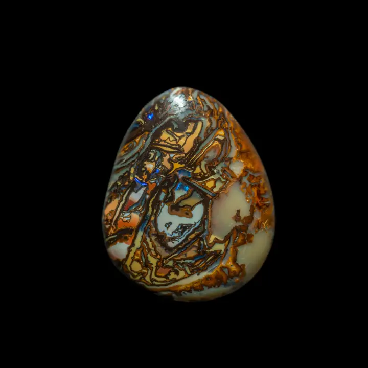 Natural Australian opal from the Koroit mines. 18.5 carat drop, polished on both sides, with contrasting coloured opalised motifs, enhanced by a few blue-violet shimmers. 