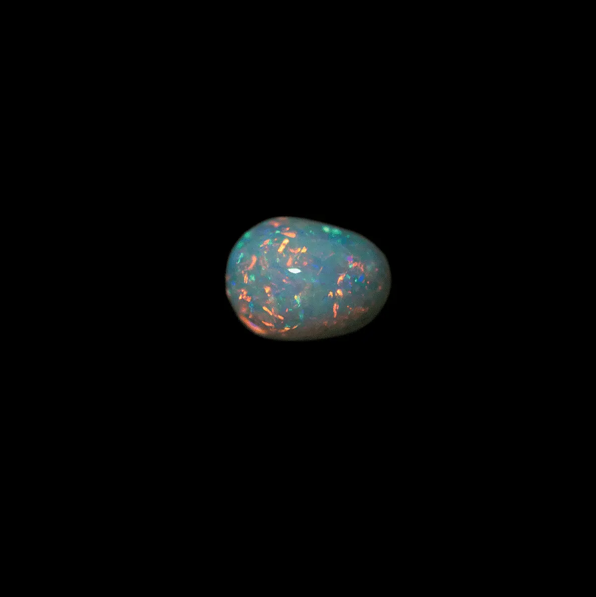 Orange-red Brazilian crystal opal cabochon (0.7 ct) - Image 3