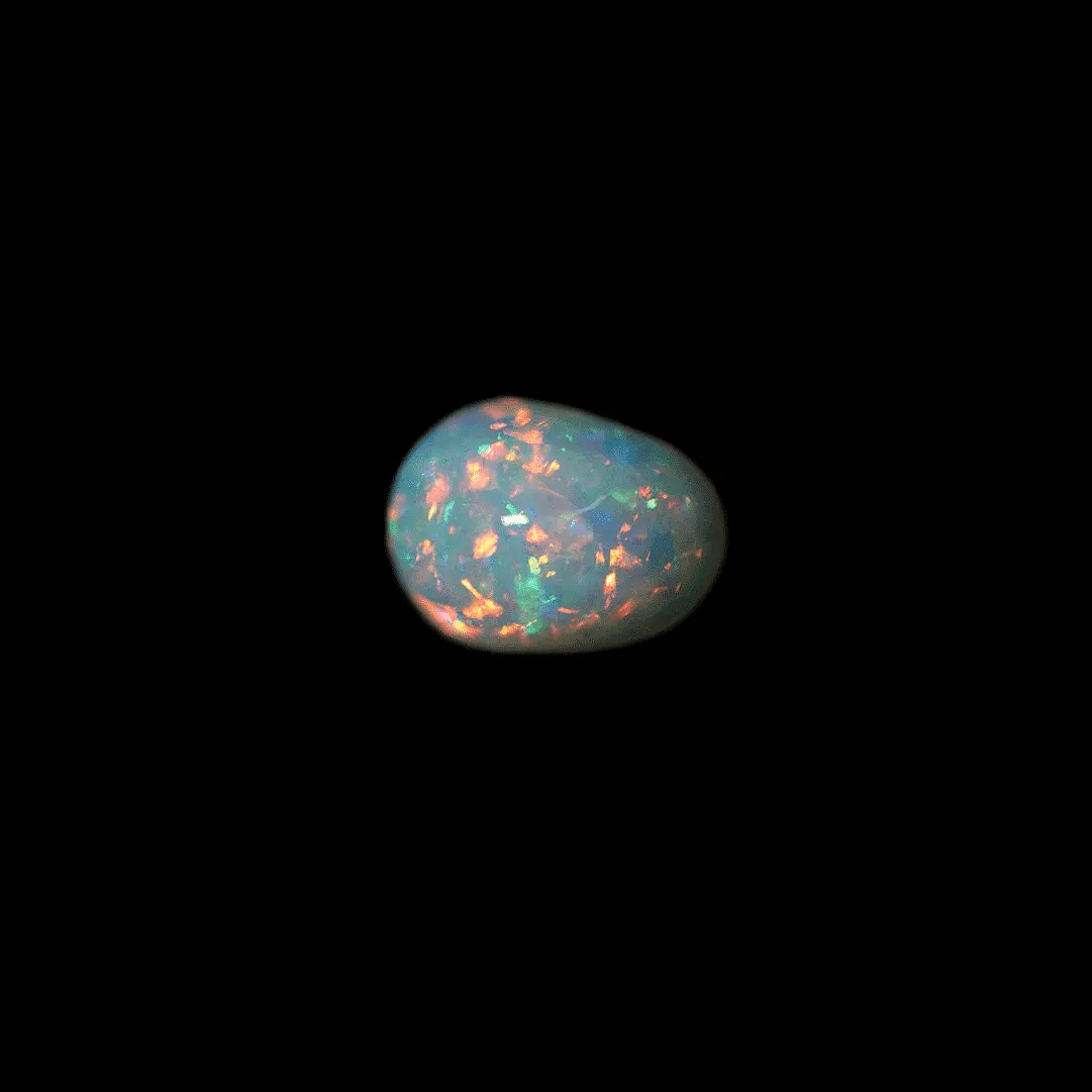 Natural crystal-clear Brazilian opal from the Horca mines, cabochon of 0.7 carat, very clear, very brilliant, very colorful, predominantly red-orange.