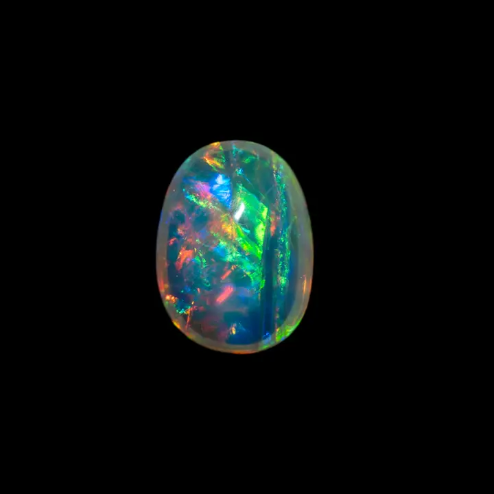 Natural Brazilian opal from the Horca mines, very clear crystal cabochon polished on both sides, 1.5 carat, total multicolored shine, changing and hypnotic.