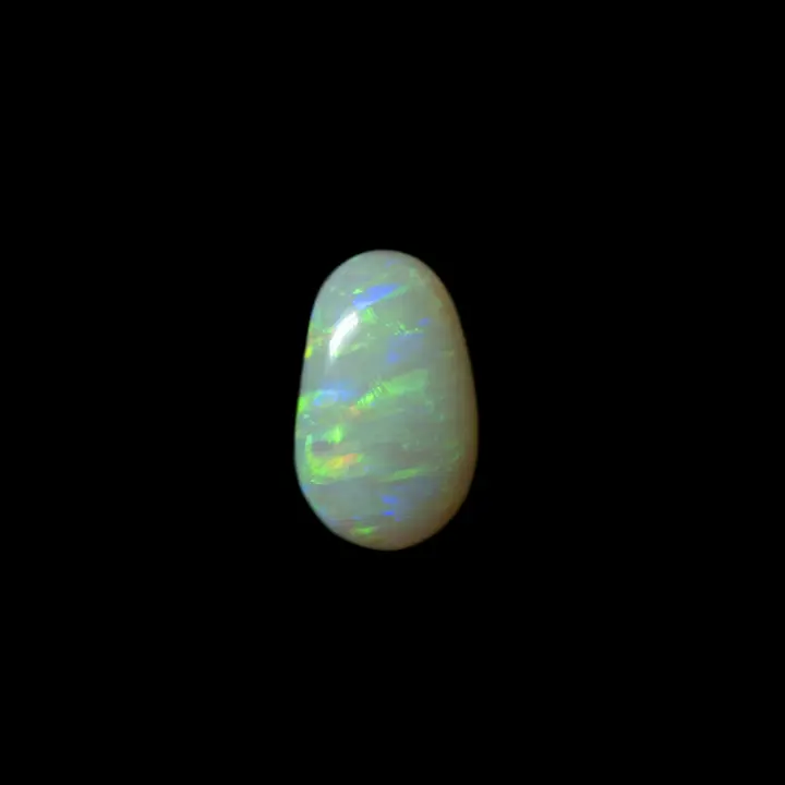 Natural Australian opal from the Coober Pedy mines, pretty little cabochon of 1.6 carat with green and purple line brilliance.
