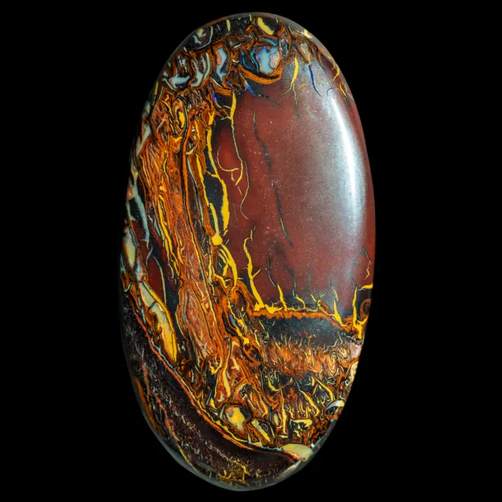 Natural Australian opal from the Koroit mines, a spectacular 33.7 carat yellow, copper, black and burgundy work of art.