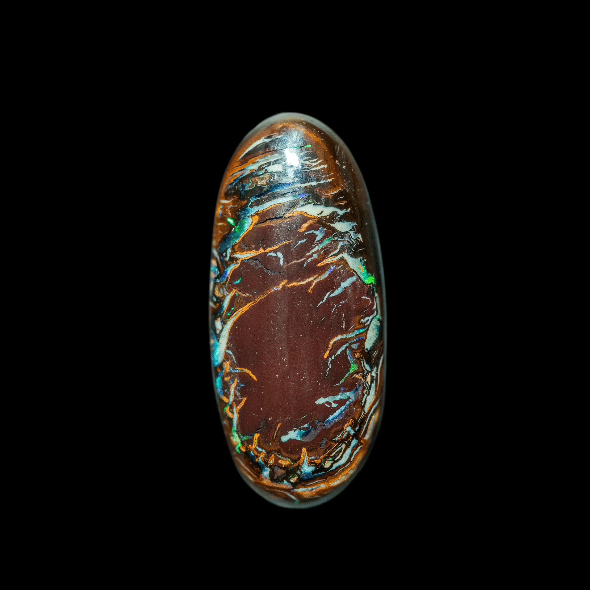 Natural Australian opal from the Koroit mines, oval cabochon of garnet opal in the center framed by colored festoons and green glitter.