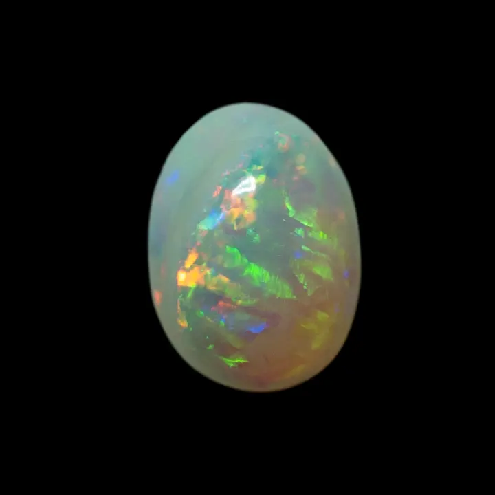 Natural Brazilian opal from the Horca mines, 0.8 carat cabochon with bright green and multicolored bands of organized brilliance