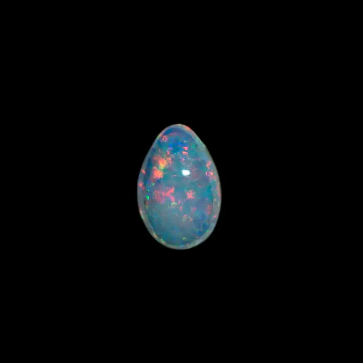 Natural Brazilian opal from the Horca mines, teardrop shape of 0.7 carat, crystalline and clear with predominantly orange and red coloured lustre.