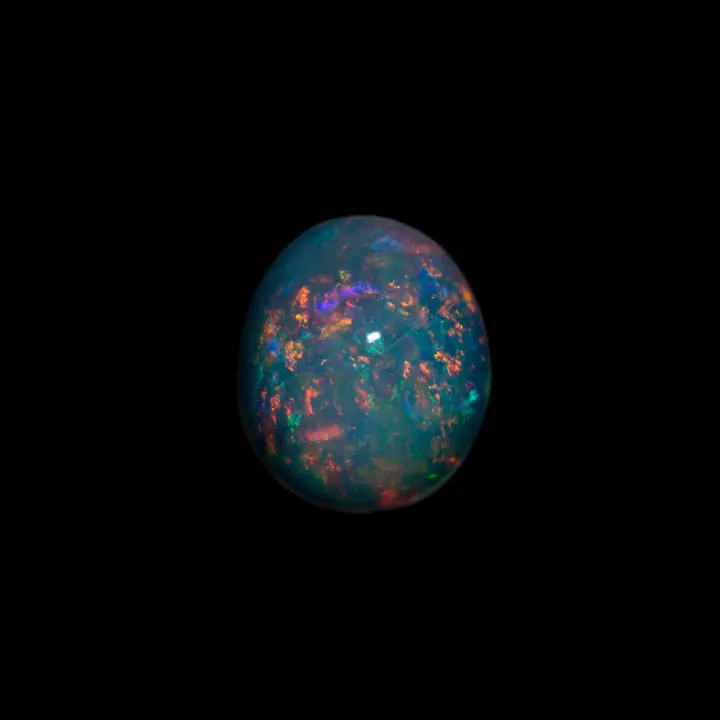 Opale naturelle brésilienne des mines d'Horca, cabochon cristal de 1,7 carats multicolore à tendance clairement orangée