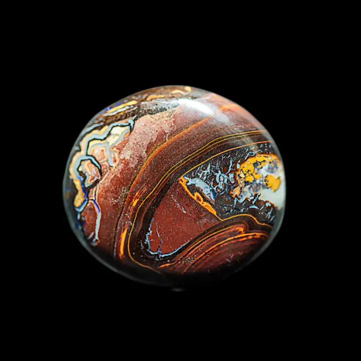 Natural Australian opal desmines Koroit, circle of 51.4 carats brown veined with yellow, orange and blue