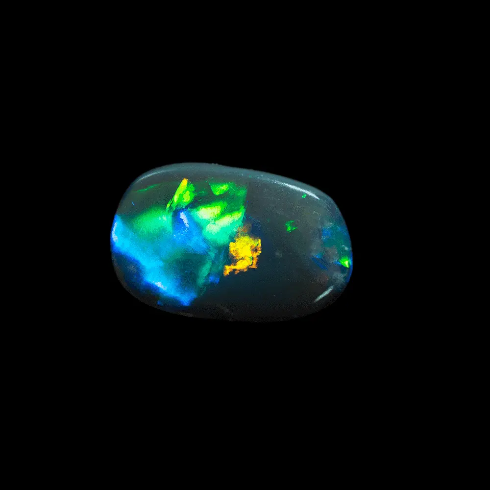 Natural Australian opal from the Lightning Ridge mines, dazzling freeform black opal with rectangular trend of 1.6 carat, explosions of blue, green and orange brilliance sectorized on either side of the stone