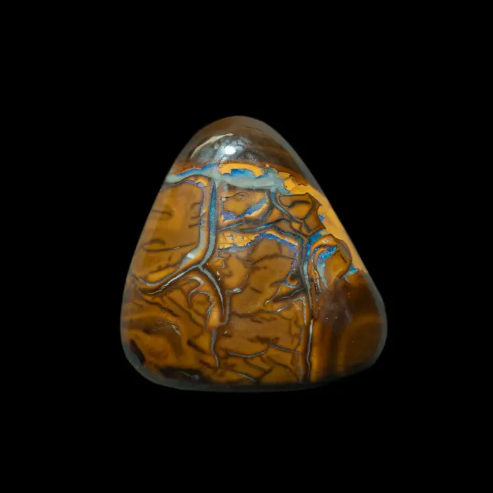 Natural Australian opal from the Koroit mines, free form 18.9 carats yellow ochre matrix studded with threads of brilliant blue opalization.