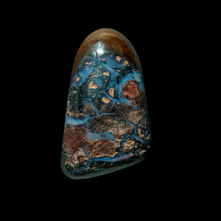Natural Australian opal from the Koroit mines, free form 19.3 carats with brown matrix crossed by flows of bluish opalization