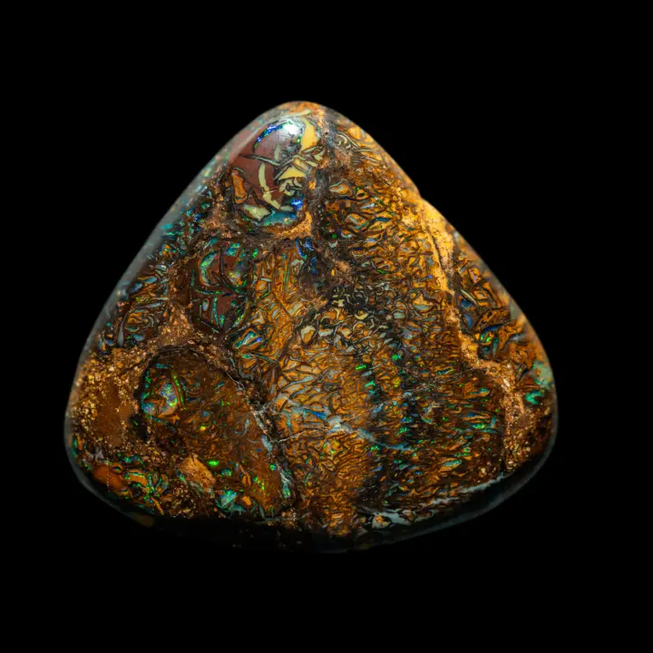 Natural Australian opal from the Koroit mines, 27.8 carat triangle shape with micro veins and opalized or colored dots.