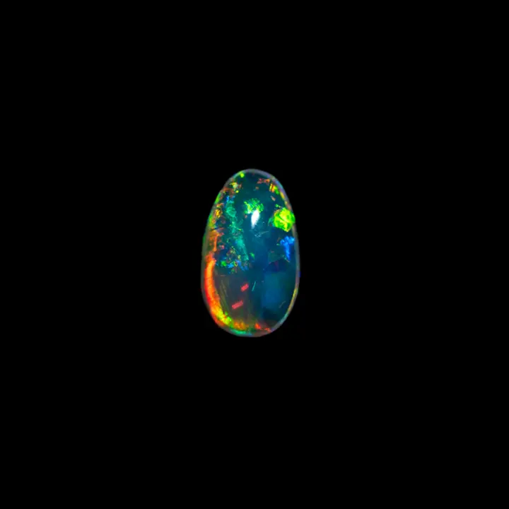Natural Brazilian opal from the Horca mines, oval white crystal polished on both sides, 0.7 carats, brilliant in all colors.