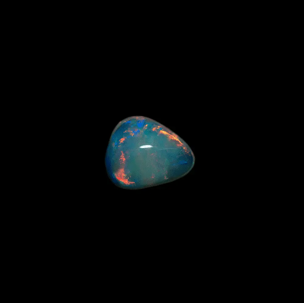 L'opale cristal tachée d'orange flamboyant (0,9 cts) – Image 7