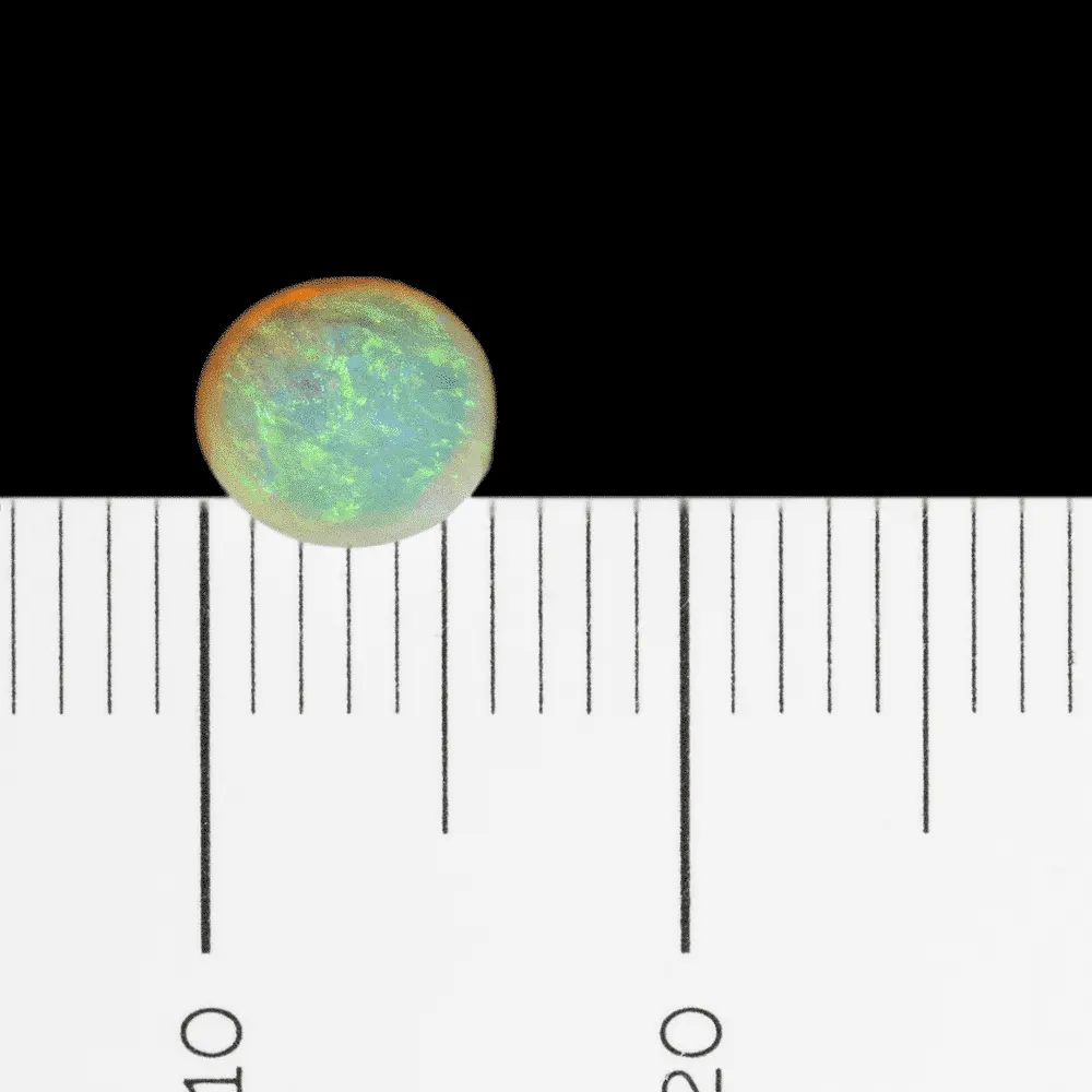 Green storm at the pole on this clear crystal opal (0.8 ct) - Image 9