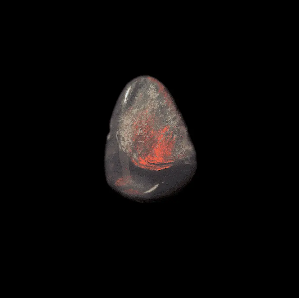 Small Red Comet on Australian Opal Triangle (0.5 ct) - Image 3