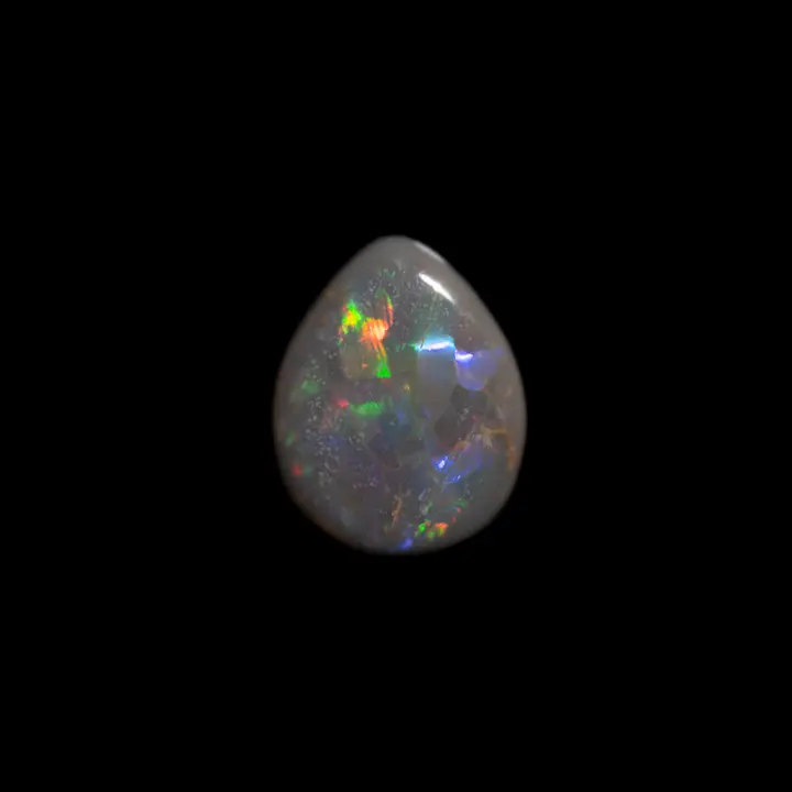 Natural Australian black opal from the Lightning Ridge mines, 1 carat teardrop shape with pretty shiny and colorful ribbons mostly red, blue and purple
