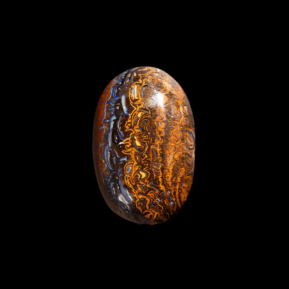 Koroit Australian natural opal, sophisticated 38.4-carat cabochon with colourful, contrasting interlacing, half ochre, half opalized blue and studded with purple micro shine
