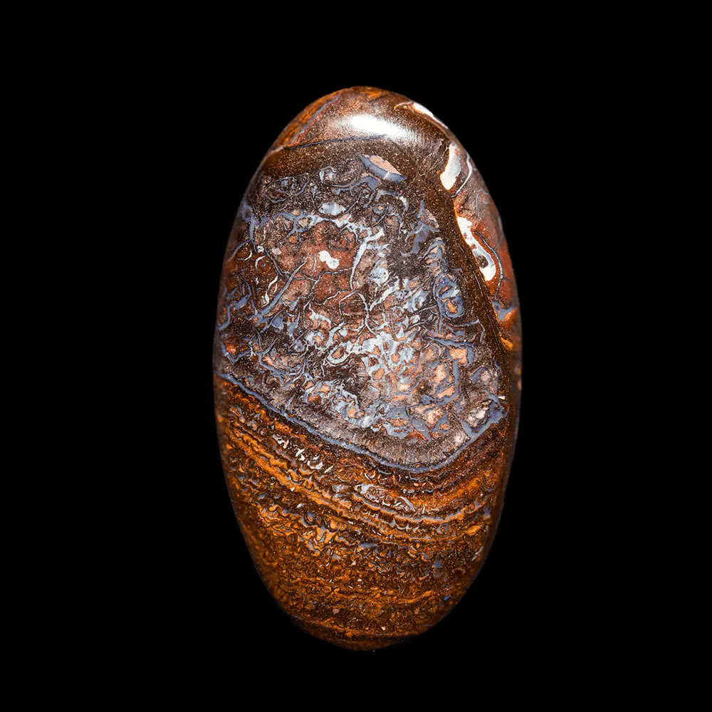 Natural Australian opal from Koroit mines, large 96.4 carat cabochon finely serrated with parm, grey-blue, ochre and ochre-red. A few dots of purple shine