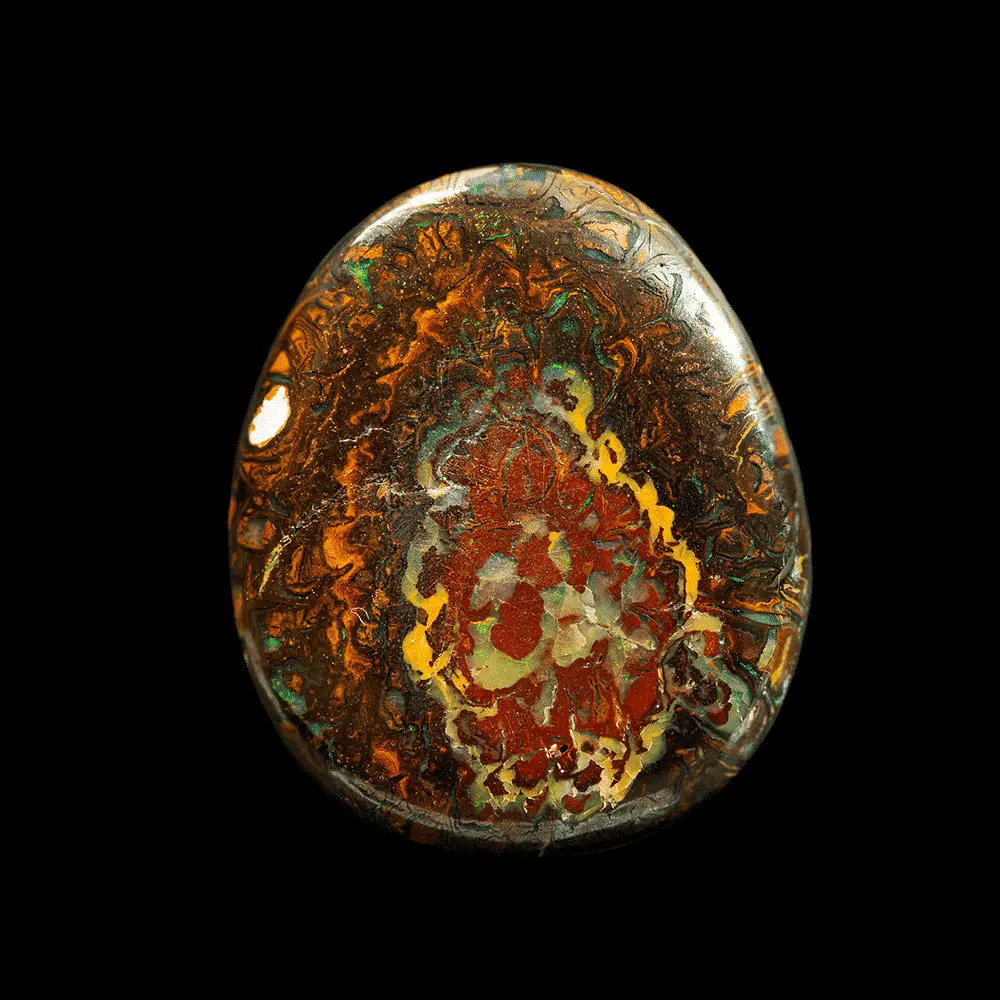 Natural Australian opal from the Koroit mines, 27 carat drop shape with colored, contrasting and opalized patterns.