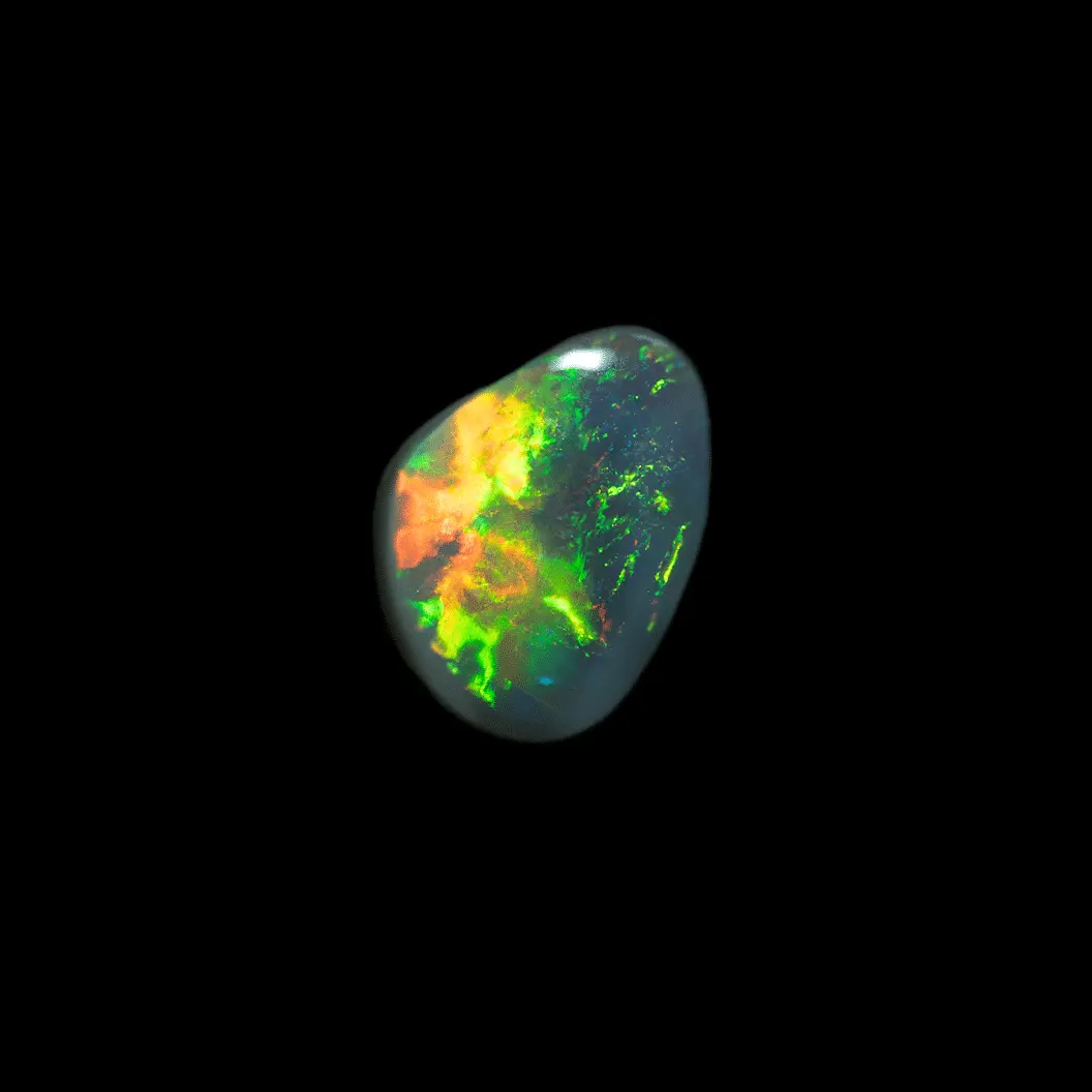 Australian black opal from the mines of Lightning Ridge, free-form of 1.2 carat multicolor whose iridescence is expressed with great variability