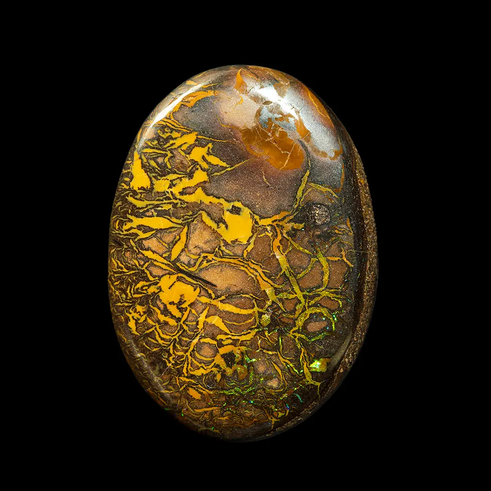 Natural Australian opal from the Koroit mines, 32.1 carat oval cabochon with characteristic brown bush matrix and yellow or iridescent green intertwined laces