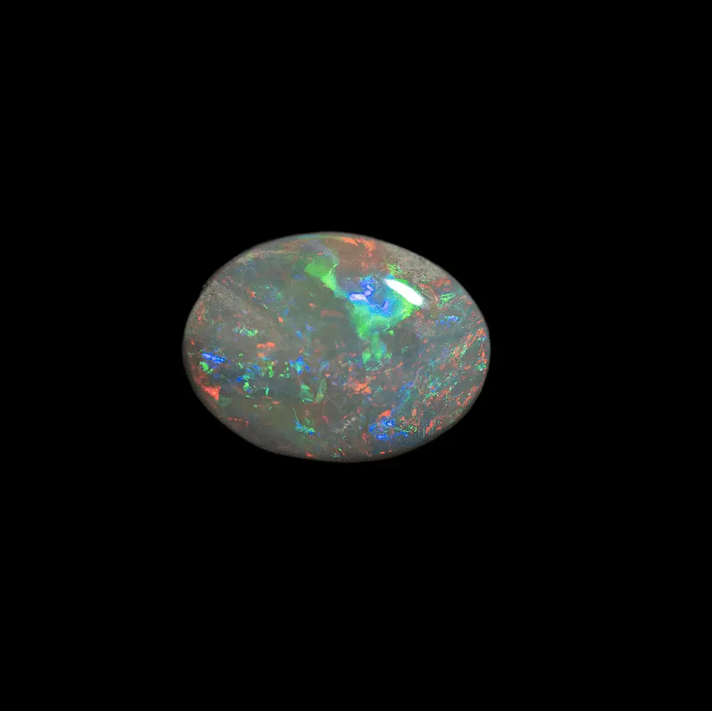 Natural Australian Opal from Coober Pedy Mines, 1.4 Carat Oval Cabochon with Clear Matrix and Multi-Coloured Extra Shine