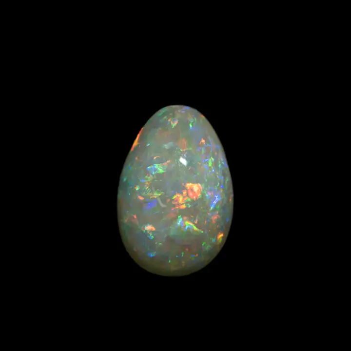Opale naturelle australienne des mines de Coober Pedy, forme de goutte de 2,8 carats à matrice claire et couleurs très brillantes multicolores typiques de ces mines