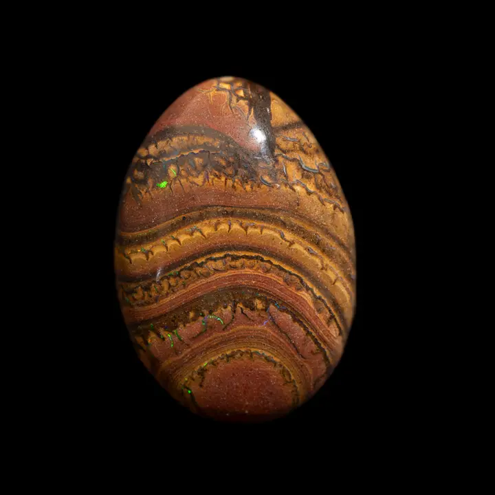 Natural Australian opal from the Koroit mines, 15.9 carat teardrop cabochon with yellow ochre and rust coloured dominance in contrasting micro-gloss strata