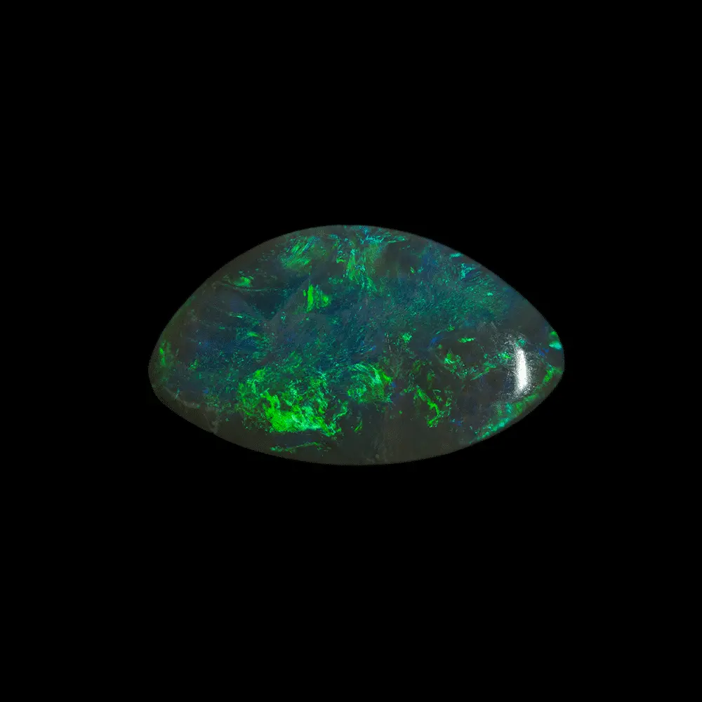 Natural Australian opal from the Koroit mines, clear tapered freeform and 2.9 carat crystal with undulating green, blue and purple shines