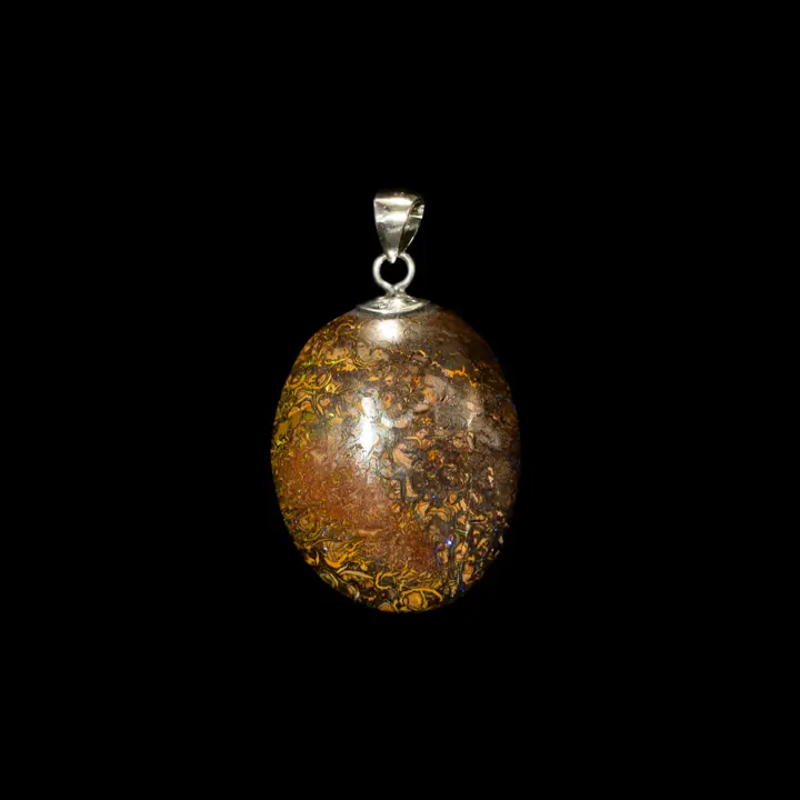 Natural Australian opal from the Koroit mines, oval cabochon of 30.3 carats mounted on a 925 silver bezel, covered with yellow filament patterns with purple and green micro-brilliance on a brown matrix.